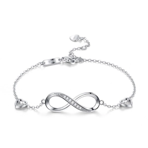 Detailed shot of 925 sterling silver infinity bracelet with small diamonds and heart charms
