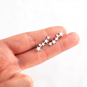 Polished S925 sterling silver five-star climber earrings shown on hand for women