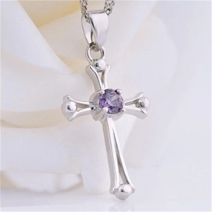 Detailed close-up of 925 sterling silver cross pendant with a central purple zircon stone