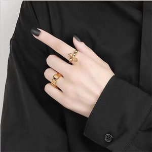 Golden 925 sterling silver twist ring with beads and hollow geometric chain design