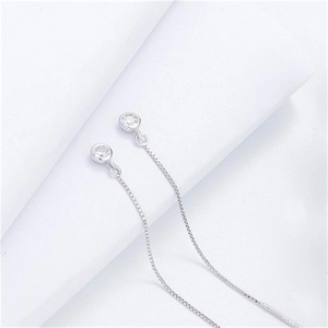 Macro shot of S925 sterling silver tassel ear line featuring a round clear zircon stud