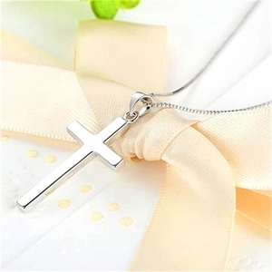 Polished S925 sterling silver cross pendant necklace on a delicate chain in a gift setting