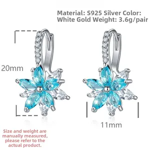 Detailed view of S925 silver blue snowflake hoop earrings with marquise zirconia