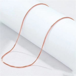 Elegant S925 sterling silver rose gold box chain necklace shown on a white display stand