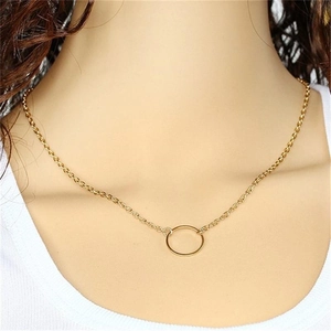 Minimalist 925 sterling silver gold circle pendant necklace worn by a model