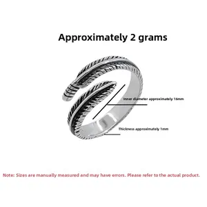 Detail of vintage silver feather ring showing 16mm diameter and 2g weight measurements