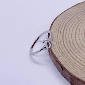 Adjustable S925 sterling silver ring featuring minimalist star and crescent moon design