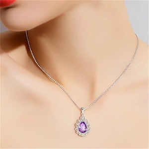 S925 sterling silver necklace with teardrop purple amethyst pendant on a female model