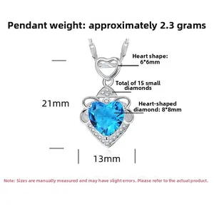 Détails du pendentif coeur avec pierre bleue et dimensions de 21x13mm en argent