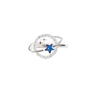S925 sterling silver planet ring with blue star and zircon paving on white background