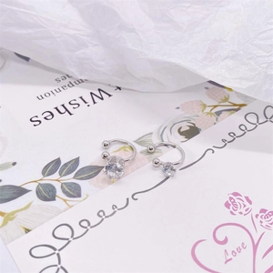 Detailed view of S925 sterling silver ear cuffs with sparkling clear cubic zirconia stones