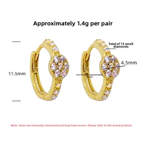 Detail view of gold S925 sterling silver hoop earrings with 13 zircon stones and size data