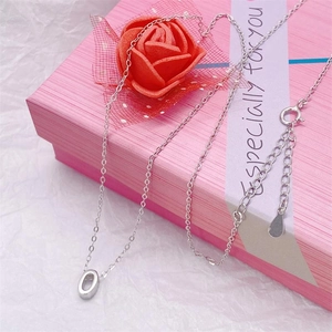S925 sterling silver 520 necklace displayed on a pink gift box with a red rose