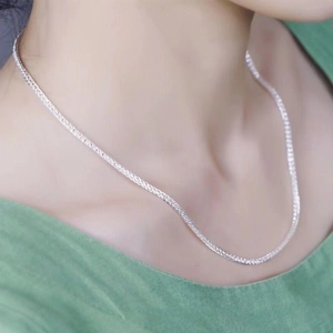 S925 Sterling Silver Chopin chain necklace on model with minimalist woven link design