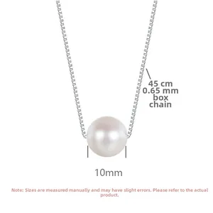 Close-up of 10mm round pearl pendant with 45cm silver box chain necklace details
