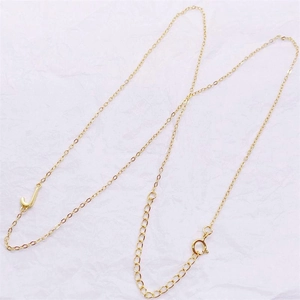 Detailed macro view of a gold S925 silver J letter pendant on a fine classic cable chain