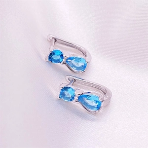 S925 sterling silver bowknot earrings featuring blue round and teardrop gemstones