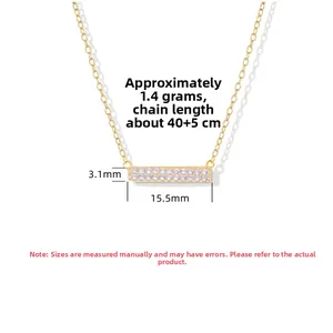 Detail of 925 silver gold bar necklace with double row purple cubic zirconia stones