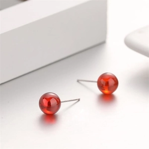 Elegant S925 silver stud earrings with round natural red garnet stones on gray base