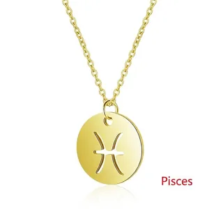 Close-up of golden Pisces zodiac pendant necklace with polished cutout design