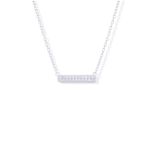 Macro shot of silver rectangular bar pendant with double row cubic zirconia on chain