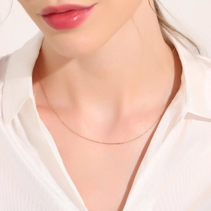 Minimalist S925 sterling silver gold plated cross chain necklace worn on neck