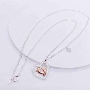 S925 Silber Herzanhänger Halskette mit Roségold Baby Fußabdrücken und Zirkonia Steinen
