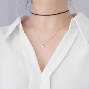 Minimalist S925 sterling silver crescent moon pendant necklace with black choker on model