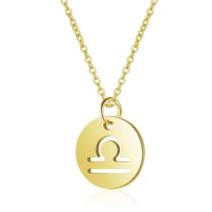 Close-up of gold 925 sterling silver Libra zodiac pendant on a delicate chain