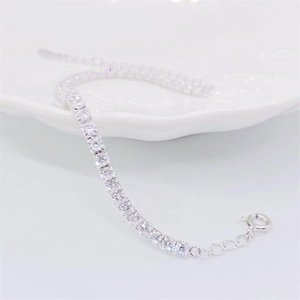 Detail of S925 sterling silver tennis bracelet with cubic zirconia and adjustable chain