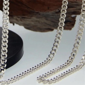 Detail view of vintage S925 sterling silver Cuban link chain necklace with polished finish