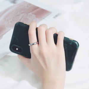 Minimalist S925 sterling silver ring featuring a polished finish shown on a hand