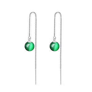 Close-up of S925 silver long threader earrings with glossy green agate beads