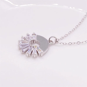 S925 sterling silver sunburst necklace featuring baguette zircon stones on a cross chain