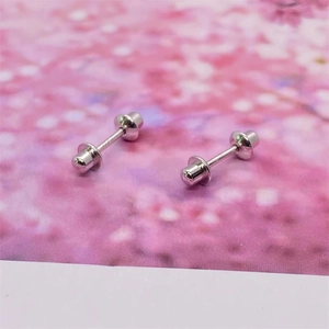 Detail view of S925 sterling silver bullet screw back earrings showing the S925 hallmark