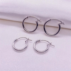 S925 sterling silver hoop earrings in two sizes on white silk background
