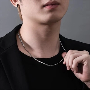 Minimalist S925 sterling silver hexagonal chain necklace on male model in suit
