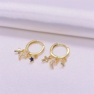 S925 sterling silver hoop earrings with gold star, moon, and cross charms on pink silk