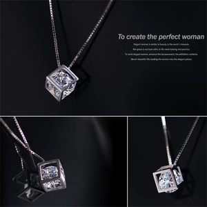 Macro detail of S925 sterling silver cube pendant with sparkling round-cut zircon stone