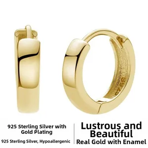 Detail view of wide 925 sterling silver hoop earrings with gold plating and S925 hallmark