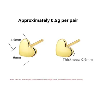 Detailed view of 4.5mm x 6mm gold heart stud earrings with 0.9mm thickness