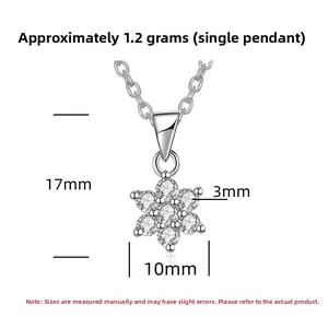 Macro shot of S925 sterling silver snowflake pendant showing dimensions of 17mm by 10mm