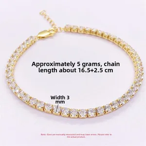 Detailed shot of gold plated silver tennis bracelet showing dimensions and 3mm width