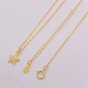 Detailed close-up of S925 sterling silver stamp and sparkling pavé star pendant