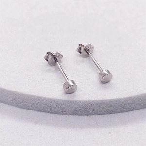 Minimalist S925 sterling silver cylindrical stud earrings with hallmarks shown on base