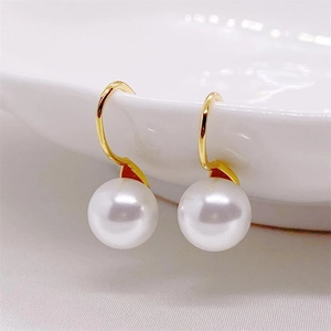 Classic S925 sterling silver pearl drop earrings with elegant golden fishhook design