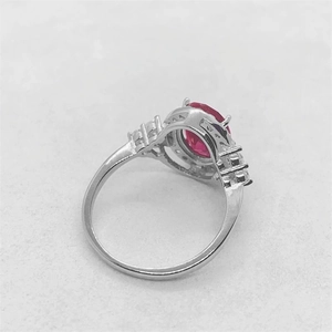 Classic S925 sterling silver ring with oval red zircon and sparkling clear side diamonds
