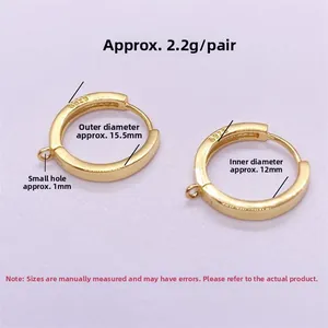 Macro detail of S925 sterling silver gold-plated hoop earrings with 15.5mm outer diameter