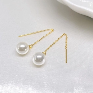 Elegant gold plated S925 silver threader earrings with white pearls on white silk