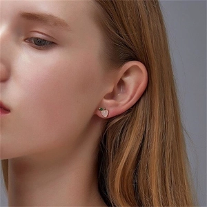 Pink apple fruit stud earrings in S925 sterling silver worn by a model for a fresh look